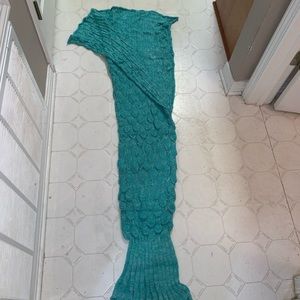 a teal mermaid blanket